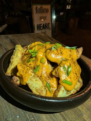 Cheesy roasted potatoes at Seva Table in Dubai