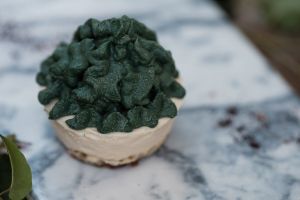 The Yuzu cheesecake is a creamy cheesecake with Japanese citrus kick and spirulina frost at Seva Table in Dubai