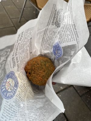 Pea and vegan cheese risotto ball  at Taste of Napoli in Bristol
