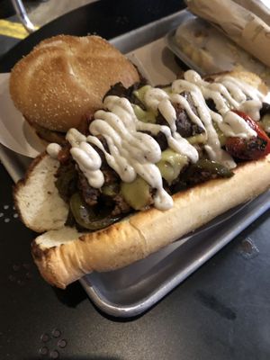 Loads Philly Cheese steak, burger Mac & Cheese. Not all for me  at Farmacy Vegan Kitchen & Bakery in Tampa