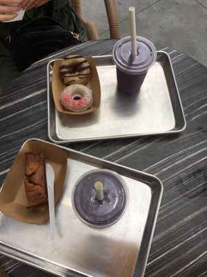 Two doughnuts, choc chip banana bread and smoothies at Farmacy Vegan Kitchen & Bakery in Tampa