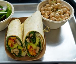 Tofu Jerk Wrap with (Dill)icious chickpea salad. at Farmacy Vegan Kitchen & Bakery in Tampa