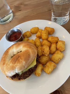 Bagel sandwich with tots  at Kahiau's Bakery & Cafe in Virginia Beach