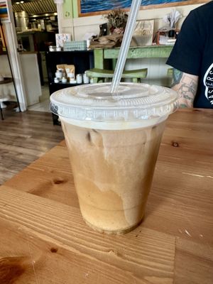 Caramel latte w/ oat milk   at Kahiau's Bakery & Cafe in Virginia Beach