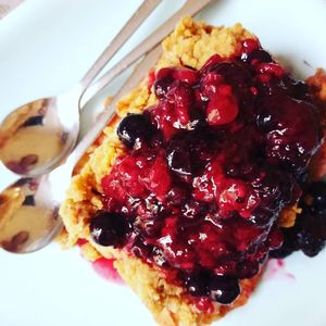 Vegan crumble topped with red fruits. at Rotas da Ilha Verde in Sao Miguel