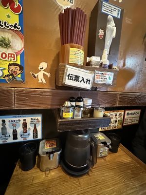 table with seasonings  at Kyushu Jangara Ramen - Akihabara in Tokyo