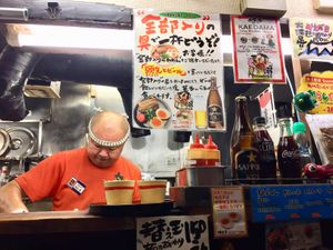 Ramen chef in action at Kyushu Jangara Ramen - Akihabara in Tokyo