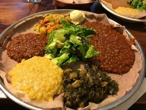 Veggie Platter with a scoop of hummus at Enssaro Ethiopian Restaurant in Oakland