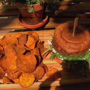Mushroom burger with sweet potato chips at Tökmag Vegan Street Food in Budapest