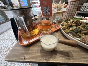 Cute oat milk jar, timer and details   at Tökmag Vegan Street Food in Budapest