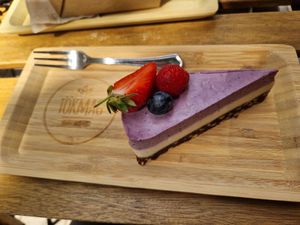 A slice of lavender-lemon cake, May 2023. at Tökmag Vegan Street Food in Budapest