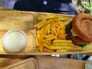 Burger with fries at Tökmag Vegan Street Food in Budapest