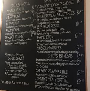 pizza menu at Johnny Dough's Wood-Fired Pizza in Llandudno