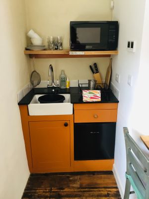 Mini kitchen  at Planted - Vegan Self-Catering Studio in St Agnes