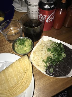 Corn tortillas (left), guacamole, rice and refried beans (right) AMAZING BEANS at The Mexican - Port Douglas in Port Douglas