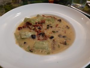Main: artichoke raviolis (so so) at Pizzi & Dixie in Madrid