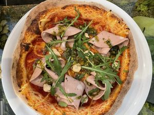 Mortadela pesto pizza  at Pizzi & Dixie in Madrid