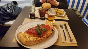 Calzone and burger at Pizzi & Dixie in Madrid