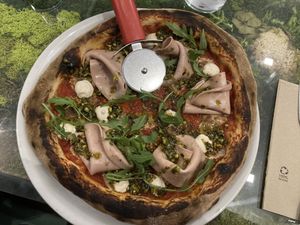 Pizza mortadella y pistacho  at Pizzi & Dixie in Madrid
