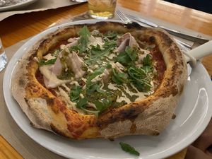 Pizza mortadela y pesto de pistacho   at Pizzi & Dixie in Madrid