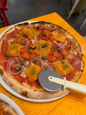 Plant based smoked salmon pizza (gluten free base) at Pizzi & Dixie in Madrid
