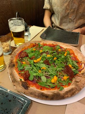 We eat 2 at Pizzi & Dixie in Madrid