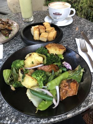 Warm vegetable salad w/ tofu on the side. The tofu was a bit salty for my taste but the salad was excellent. I’d definitely get it again.  at Bana in Tel Aviv