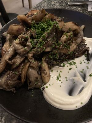 Oyster mushrooms with baked potato and sour cream - vegan and delicious   at Bana in Tel Aviv