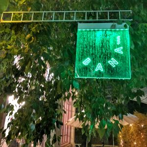 Their sign looked romantic in the rain. at Bana in Tel Aviv