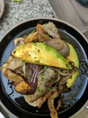 Grilled avocado and forest mushrooms at Bana in Tel Aviv