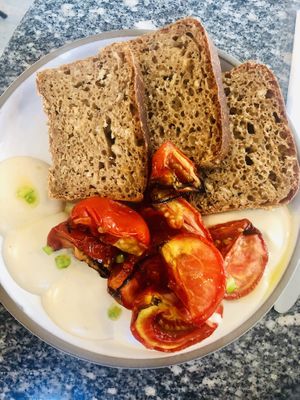 Bread tomatoes and tahini  at Bana in Tel Aviv