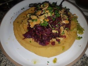 Roasted cabbage, sliced almonds dukka mix at Bana in Tel Aviv