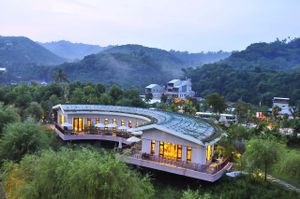 The Camphor Grove (樟樹林) Waterdrop Tea House was designed by Venerable Tzu Hui, an early disciple of Venerable Master Hsing Yun. The tea house serves the signature Soybean Noodles and a rice meal everyday. Visitors can pay by donations after the meal. at Dīshuǐ Fāng 滴水坊 - Waterdrop Teahouse in Kaohsiung