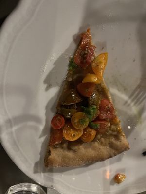 Pizza - cherry tomatoes and arugula pesto  at Vegan Agrivilla I Pini in San Gimignano