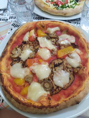 Contadina (spicy eggplant, peppers, mushrooms) with vegan cheese at La Taverna di Pulcinella in Pisa