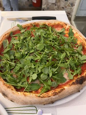 Pizza with vegan cheese and rocket   at La Taverna di Pulcinella in Pisa