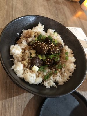 Glazed “meatball” 20 - dark soy and sambal glazed “meatballs” sushi rice, scallions , sesame    at Beyond Sushi in New York City