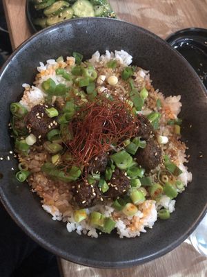 Glazed “meatball” 20 - dark soy and sambal glazed “meatballs” sushi rice, scallions , sesame    at Beyond Sushi in New York City