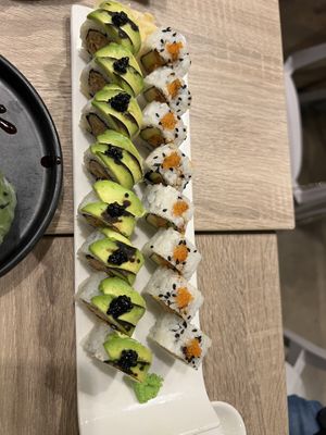 Charred avocado roll + tuna something roll   at Beyond Sushi in New York City