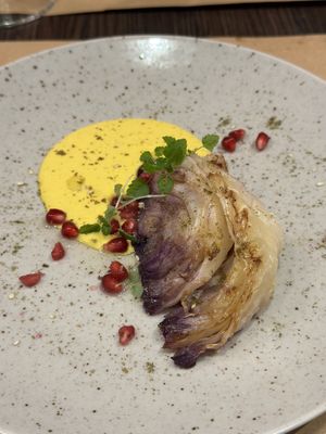 Roasted cabbage, turmeric soy yoghurt, aromatised olive oil, za’atar  at Bistro Maha in Ljubljana