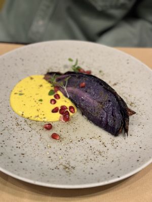 Roasted cabbage, turmeric soy yoghurt, aromatised olive oil, za’atar  at Bistro Maha in Ljubljana