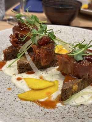 Vegan fillet mignon, bread dumpling, sage sauce, rosehip & umeboshi marmelade, celery, apple  at Bistro Maha in Ljubljana