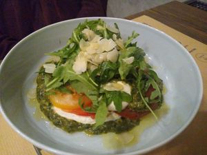 Tomato carpaccio with almond ricotta and pesto at Bistro Maha in Ljubljana