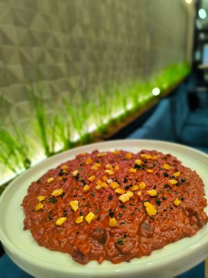 Beetroot & red wine risotto with candied orange and mint. at Bistro Maha in Ljubljana