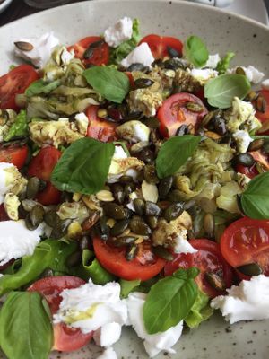 salat with pumpkin seed oil and vegan feta at Bistro Maha in Ljubljana