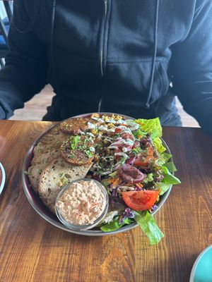 Scramble tofu with salad and sausage  at LYR Speciality Coffee and Food in Pecs