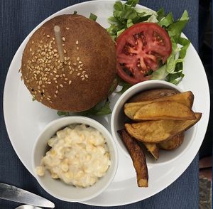 ’Over the top’ burger with sweet corn salad at LYR Speciality Coffee and Food in Pecs