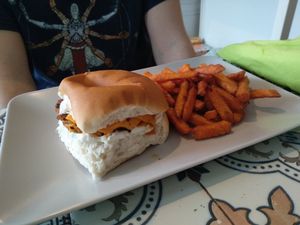 Chick'un burger with veggies removed and vegan cheese added, with a side of sweet potato fries at The Peppercorn in Huddersfield