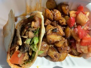 Mushroom wrap, bravas & fruit salad side at The Peppercorn in Huddersfield