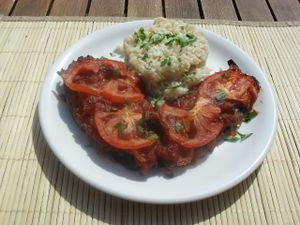 "Imam Baildi" Aubergines, stuffed with lots of sliced onions, baked in the oven with tomato sauce and served with wild organic rice. at Talos Restaurant in Crete
